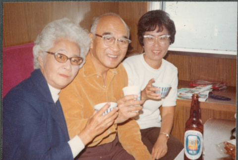 Agnes and Chester Sakura with another woman drinking (ddr-densho-523-574)