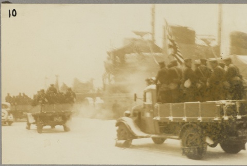 Trucks carrying soldiers (ddr-njpa-13-1407)