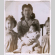 Mitzi Isoshima with her three children (ddr-densho-477-204)
