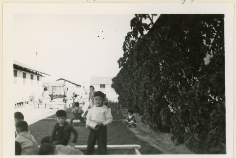 Children playing on a playground (ddr-densho-37-1063)