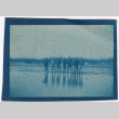Eight men standing in muddy field (ddr-densho-329-1383)