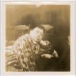 Man in robe leaning on table (ddr-densho-426-1688)
