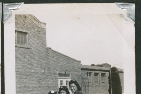 Three girls in front of school (ddr-densho-550-132)