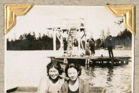 Two women in rowboat (ddr-densho-383-302)