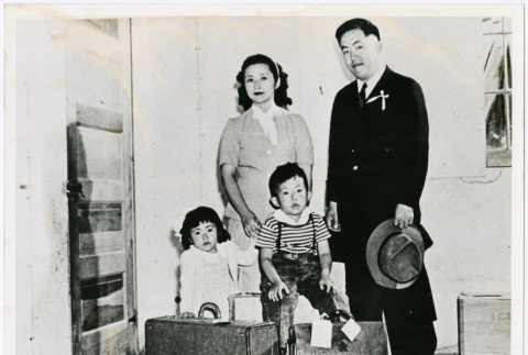 Family with suitcases (ddr-densho-122-733)
