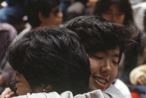 Mariko Yanagihara and Trace Tanimoto hugging on the last day of camp (ddr-densho-336-1617)
