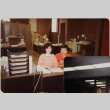 Man and woman at desk (ddr-densho-426-1280)