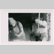 Two men pounding mochi (ddr-densho-456-35)
