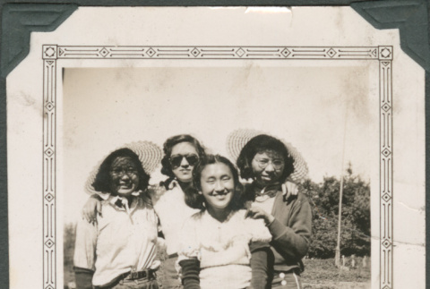 Four women in field (ddr-densho-316-344)