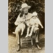 John D. Rockefeller seated with two small children (ddr-njpa-1-1432)