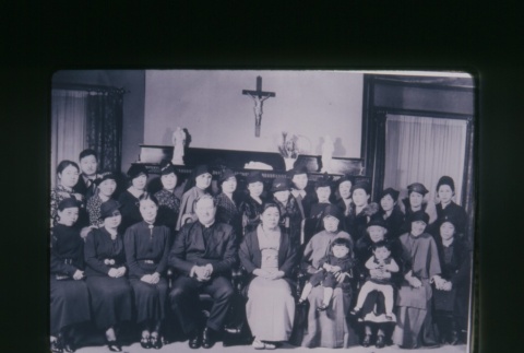 (Slide) - Image of priest, nuns and women in front of fireplace (ddr-densho-330-47-master-f11b44d49f)