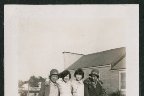4 women in a yard (ddr-densho-378-378)