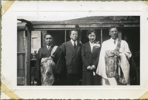 Rev. Shinjo Nagatomi with three others (ddr-manz-4-121)