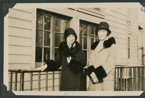 two women outside a house (ddr-densho-378-514)