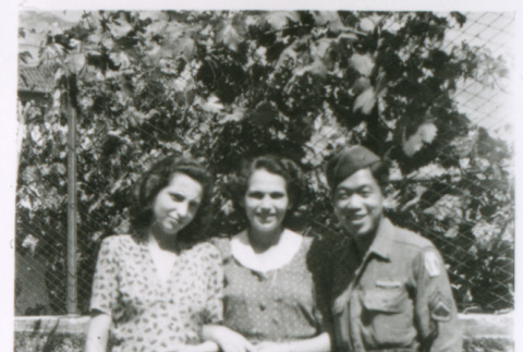 Two women and one soldier outside (ddr-densho-1007-792)