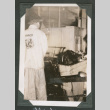 Man working at cannery (ddr-densho-540-73)