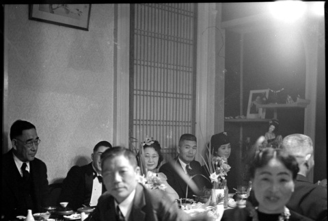 Group seated at banquet tables (ddr-densho-426-2023)