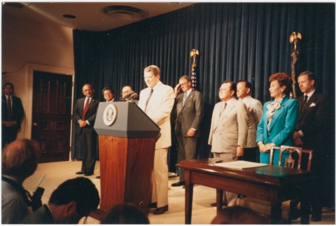 President Ronald Reagan speaking at the signing of the Civil Liberties Act of 1988 (ddr-densho-10-172)