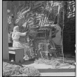 Japanese Americans making camouflage nets (ddr-densho-151-411)