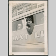 Photo of Tsutomu Fukuyama leaning out a bus window (ddr-densho-483-328)