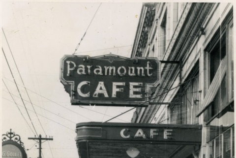 Japanese Americans in front of the Paramount Cafe (ddr-densho-201-25)