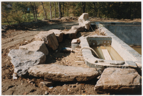 Pool with rock feature under construction (ddr-densho-377-2405)