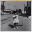 Susan Shiomi eating a banana (ddr-densho-522-308)