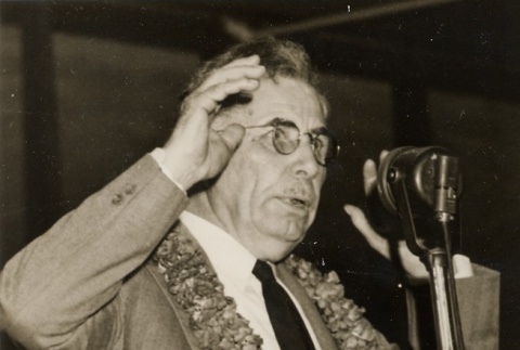 Man speaking into a microphone (ddr-njpa-2-865)