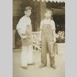 Two men in front of shop (ddr-densho-128-70)