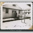 Man in uniform standing outside Mess Hall (ddr-densho-434-29)