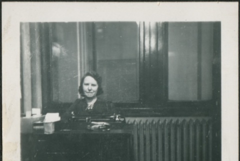 Rosie O'Grady seated at her desk (ddr-densho-298-233)