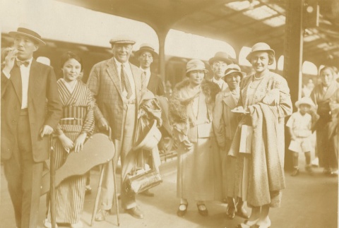 A group at a train station (ddr-njpa-1-2613)