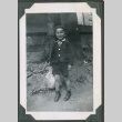 Photo of a child in a uniform (ddr-densho-483-917)