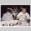 Couple Eating Dim Sum (ddr-densho-477-412)