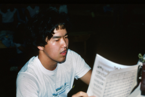 Kirk Tamura reading music (ddr-densho-336-1459)