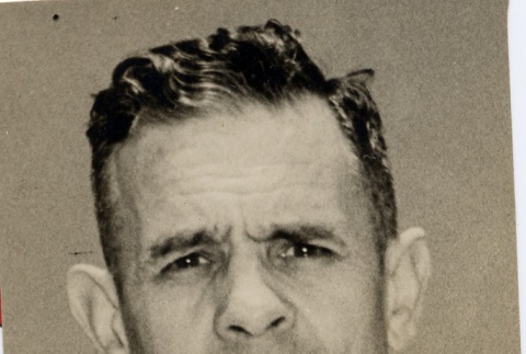 Man wearing leis (ddr-njpa-1-1578)
