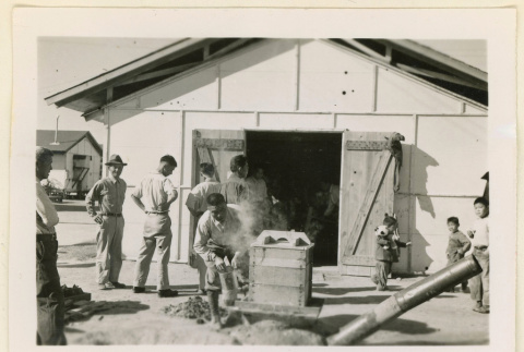 Steaming rice at camp (ddr-densho-37-1310)