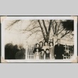 Group of adults and children near white fence (ddr-densho-321-210)