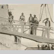 Franklin D. Roosevelt and others on the gangway of a naval ship (ddr-njpa-1-1591)