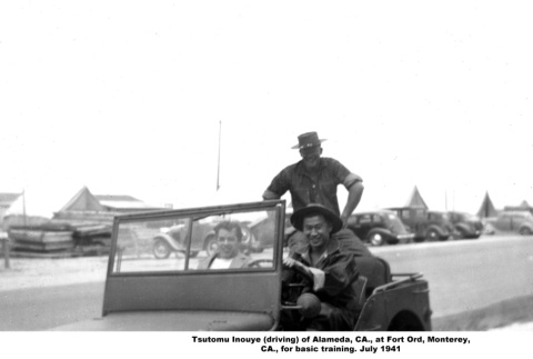 Tsutomu Inouye driving jeep with two other men (ddr-ajah-6-483)