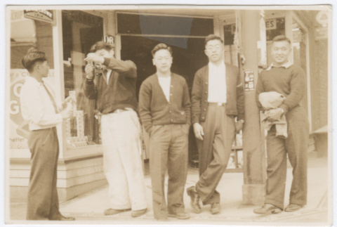 Five men standing outside drugstore (ddr-densho-383-392)