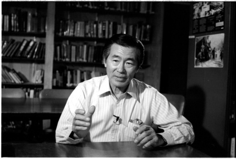Frank S. Emi at desk (ddr-densho-1007-1155)