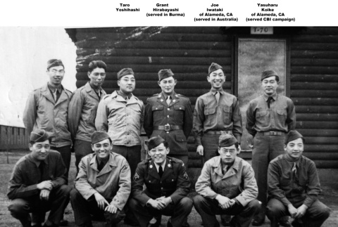 Group of men posing for photo outside barracks (ddr-ajah-2-809)