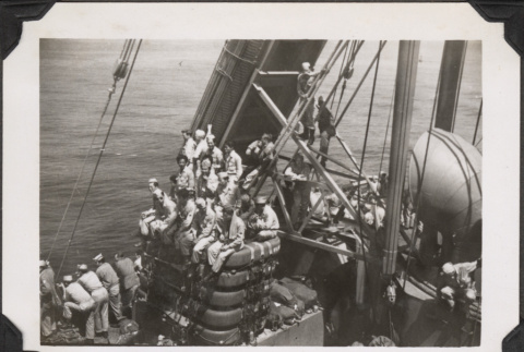 Men on board ship (ddr-densho-466-161)