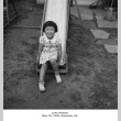 Young girl on slide (ddr-ajah-6-35)