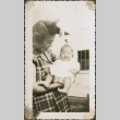 Woman holding a baby (ddr-densho-321-1084)