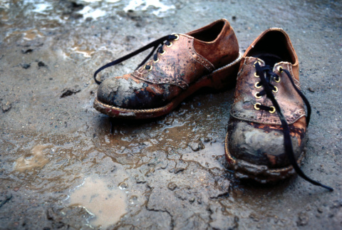 Muddy shoes on a beach (ddr-densho-336-389)