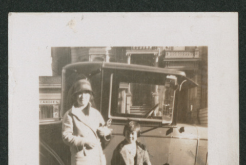 woman and child next to a car (ddr-densho-378-807)