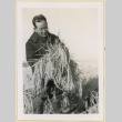 Mr. Nakata with a rice crop (ddr-densho-37-1197)