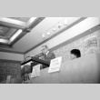 Stanley Diamond speaking, Wilma Chan at table (ddr-densho-1007-540)